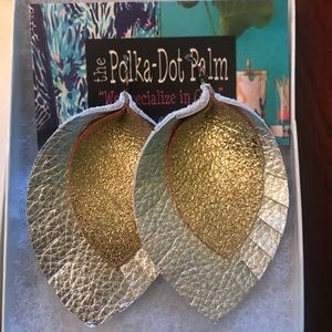 “Leather” earrings. Gold and silver.